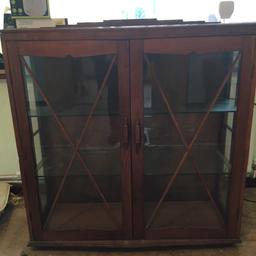 Glass display cabinet. 
Excellent condition with lockable doors
£40 Ono