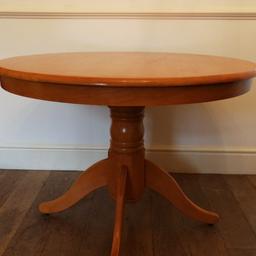 Free if collected. 
Circular dining table. Good condition.
107cm x 107cm. Solid base.
1 scratch as picture shows.