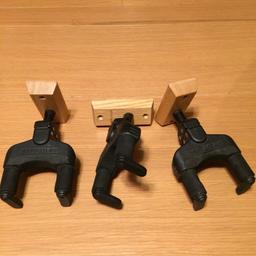 Three Hercules automatic grabbing wall hangers. Good condition. Cost £12 each when new. Guitars look great on your wall and are safer from being damaged. All you need is six screws and wall plugs and you are good to go.