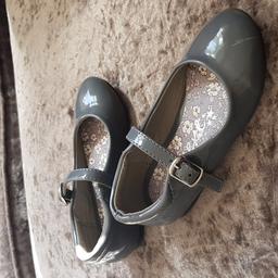 Lovely grey shoes 
Worn once at a party 
Few scratches but don't fit my daughter 
Pick up only 
Denton area