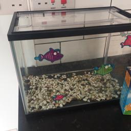 Kids fish tank with removable decorative stickers, with or without the stones 
(L) 24cm x 32cm (W)