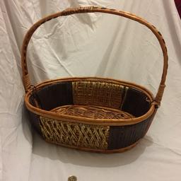 Beautiful gold detail on front and back . Strong, attractive large gift basket. Diameter /size is approximately 11 inches by 7 inches.