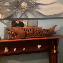 Beautiful hand carved wooden fish. It is intricate and interesting