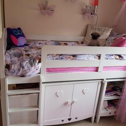 Girls bed with built in cupboard and desk.
Sold as seen