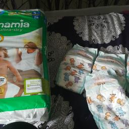 Full pack of nappies size 5+ and 4 single ones
