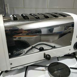 Used Dualit 6 slot toaster in good working order and fair looking condition.

Worn heating elements were replaced by new ones for extra peace of mind. Timer, switches and lever works perfectly. There are few imperfection on the metal see pictures for details.

You can select the number of slots to heat up as you wish.

These toaster are built in UK and designed to be serviceable and this one is in good working order!

Can post within UK will cost £10 typically.

Thank you for looking.