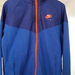 Nike zip up jacket.size medium.hardly wore and in good condition.