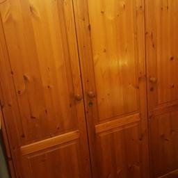 Solid wood.. did not come flat packed was bought as is from The Pine Store in St Albans.. Will not be taking apart. 1 double wardrobe and the end one is deep shelves. Ling drawer underneath and 1 small drawer.  It's in great condition.  Size 190 high by 135 wide. Depth 55cm