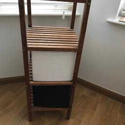 Fantastic for storage!!
Three tiered wooden storage tower.
Including two sturdy material storage boxes (one black, one white) that are easily collapsible if you wanted to use just the wood shelves instead.