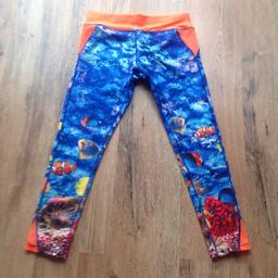 Size 10 gym leggings from Sports Direct. 

Aquarium patterned. Concealed zip pocket on the back. Worn once for light exercise.