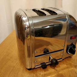 Used Dualit Classic 2 slots Vario toaster in working order.

Heating elements, timer, switch and ejection lever all in working order. Heating elements are original Dualit ProHeat elements.

You can select to heat up one toast or both, given extra flexibility and save energy.

These toaster are built in UK and designed to be serviceable and this one is in working order!

Please note this is a used toaster so there are some scratches.
Post usually £10
