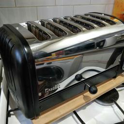 Used Dualit Vario 6 slot toaster finished in Matt Black. Comes with the Original Dualit ProHeat elements. 

Selectionof 2,4 or 6 slice for extra flexibility and energy efficiency. It also has defrost function 

Timer, selector and lifter lever are in good working order. Elements are heating up as it should see pictures. 

It is in good condition and pictures speaks for themselves. Any question please do not hesitate to ask.

Post is usually £10
