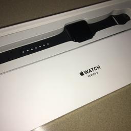 Has a black Sports Band, comes with the Apple Watch charger and plug and original packaging.

This watch is in immaculate condition.