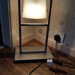Does have some scratches on it due to use and storage hence the cheap price. Quite a heavy, sturdy lamp