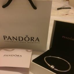 Never been worn Pandora Silver Bracelet 18cm has box, bag and cleaning instructions