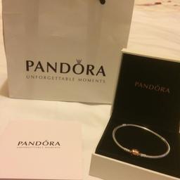 Never been worn Silver with Gold clasp Pandora Bracelet 18cm comes with box, bag and cleaning instuctions