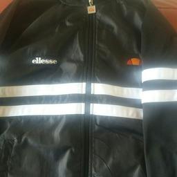 Ellesse  top good condition pick up or can deluver ashton area