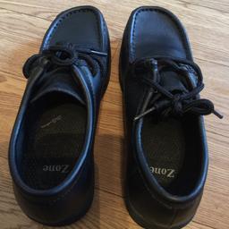Size 5 unisex black sch shoes. Only tried on bt never worn as came up to small on my childs feet. Excellent condition.
