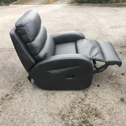 La-z-boy manual recliner black leather chair. Great condition, never used, been stored in my garage. Retails at over £1000.
