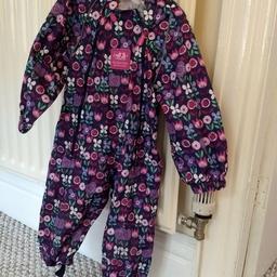 12 - 18 months. My girls used them until 24 months as they are small built! These suits are of great quality and very pretty. In great condition. Packs itself into a small pocket, great feature to carry around with you.