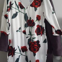 Lovely new dress, stretchy fabric. Buyer collects from WGC.
