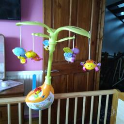 Fisher price cot mobile only use once excellent condition plays loads of different songs and lights up