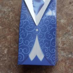 Lovely blue suit wedding favor boxes ideal for chocolate or sweets. There are 43.