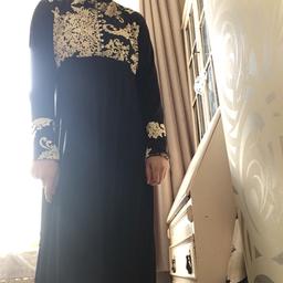 Size: 56/UK Large

Colour: Black and Gold

Design: Abaya with champagne gold floral embroidery

Brand: Muhmin

Condition: Only worn for photos, brand new

Website info: Featuring intricate lace embroidered detailing on the bodice and cuffs. classic flowing style dress made from high quality Korean jersey. Limited edition piece sure to be a timepiece in your wardrobe.
—
Tags:
(kaftan, dubai, abaya, farasha, jalabiya, maxi dress, jilbab, eid, wedding, nikah, walimah, mehndi, party, modest, prom)