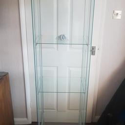 Glass display unit can dismantle for transport selling due to colour change also u can fit a light in top thanks for looking. Flat packed and ready to go .local delivery possible .