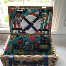 Never used and in perfect condition! Great little picnic basket to serve two. Includes:
> Two plates
> Two spoons, forks and knives
> Salt and pepper shaker
> Bottle/wine opener
> Two plastic wine glasses