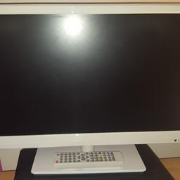 White 22inch tv and built in dvd all working order not long bought it so in excellent condition comes with remote control