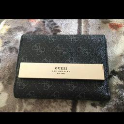 Bran new guess ladies purse for sale. Colour black with silver bar with Guess wrote on the front. No flaws or defects. Has not been used.
Comes from a smoke free home. 

Collection from North Reddish Sk5