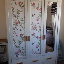 Shabby chic wardrobe.  Double has hanging rail and single has shelves.  2 large drawers and 
2 small . Solid . H73INCH/W49INCH/D21INCH pick up Old Whittington