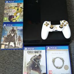 Ps4 has a 2tb hard drive and comes with custom controller and 4 games Destiny,Fifa 17,The Elder Scrolls Online and Call Of Duty Advanced Warfare