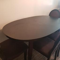 Large Laurence Llewelyn-Bowen black dining table (chairs are no longer available)

Minor wear and tear