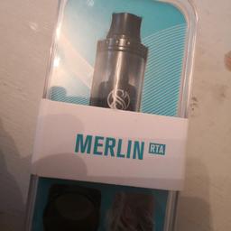 Fantastic condition!
Comes in original box with all original accessories, including:

4ml/23mm Merlin rta
Spare black tinted glass
Alan key
Spare o'rings
Spare post screws
Mtl attachment
User manual

Mainly for single coils but can also be used for dual coils.
The merlin is a 2 in 1 tank that can be used for direct lung or mouth to lung.
There's an attachment in the box that you simply screw into the deck to narrow the chamber diameter and reduce airflow.

Can post.

vape, vaping, ecig