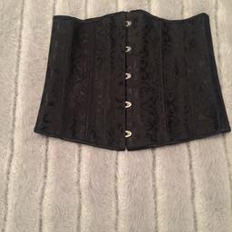 Corset style black waist trainer size L. In perfect condition for further information please PM me. Thanks