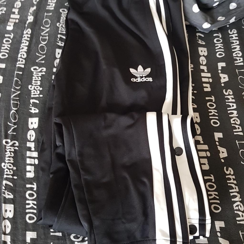 Tuta adidas outlet bottoni