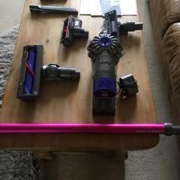 DYSON CORDLESS HAND HELD HOOVER 
30 minutes run time 
Direct drive cleaner head 
Hard floor cleaner head
Mini motorized tool 
Stair cleaning attachment 
Crevice tool
Combination tool
Comes will all accessories shown in the picture 
Excellent suction 
Great condition 
Barely used