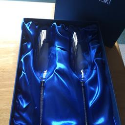 Swarovski champagne flutes new and boxed 
Cash in collection or can post it (please add £3.95 for shipping if you are not collecting)