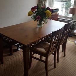 Solid wood, tinted pine table with metal decorative structure. Very sturdy and beatiful piece. 6 matching chairs. All in good condition. Signs of usage but barely niticeable. Table is dismantled and ready for collection. It is heavy so will need 2 people to collect.