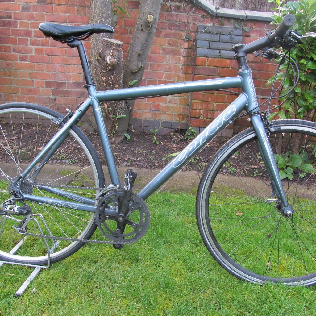 carrera gryphon hybrid bike