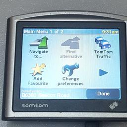 Tomtom one in good working condition with charger and mount .