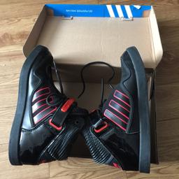 Trainers size 5 hardly used in very good condition colour black & red.
