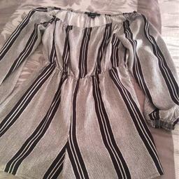 Striped black and white play suit, size 12 does come with a small black belt