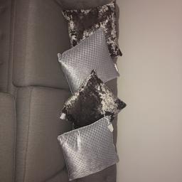 4 x grey / silver cushions. Never used with tags. Retail price £20 each.