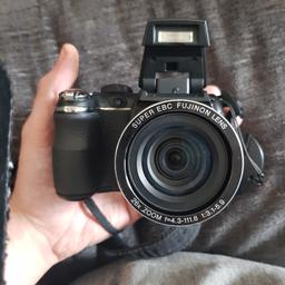 Finepix s3300 14mp camera with 26x zoom 24mm wide angle lens the camera is in good condition takes excellent photoes easy to use comes with box instructions cables and battery charger 70 ono