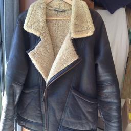 Size 42 Leather and Suede sheepskin jacket in the style of a flying jacket. Very well made and in excellent condition. Will only consider sensible offers. Have reduced it for a quick sale as need the space in the wardrobe!
