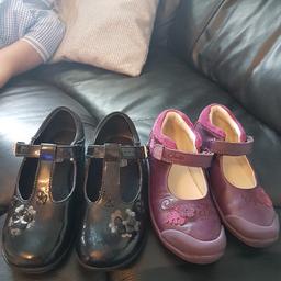 2 pair of kids Clark's shoes Brill condition not been worn much black ones flash on the heal other ones are purple both 9 f size