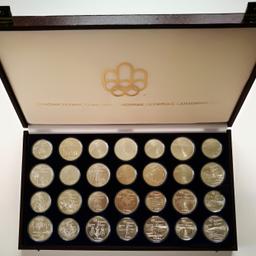 Olympiaserie Montrral 1976 
- TOP Zustand
- 28 Münzen 925er Sil
- 1976 Kanada Olympiaserie
- Gewicht 1020g
- prägefrisch in Kassette